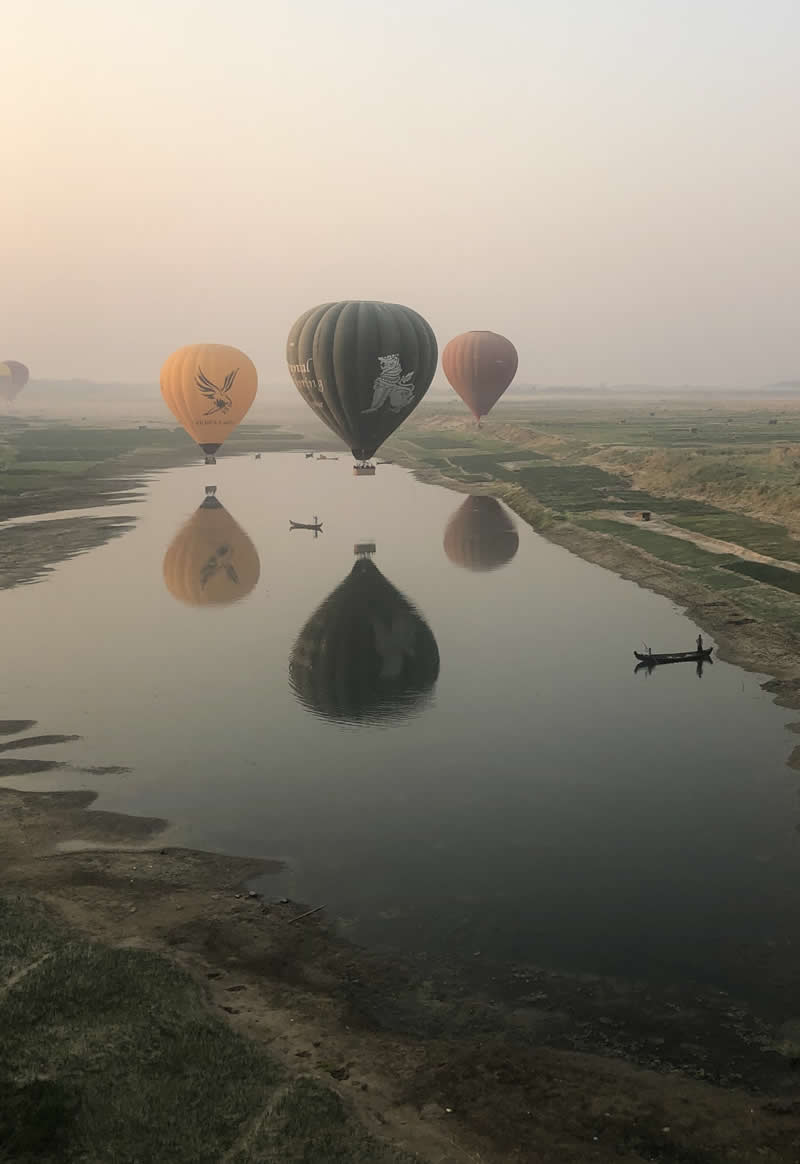 بهترین عکسهای سال ۲۰۲۵ از نگاه ویراستاران DPReview (۲۴ مورد برتر) بالنها بر فراز میانمار